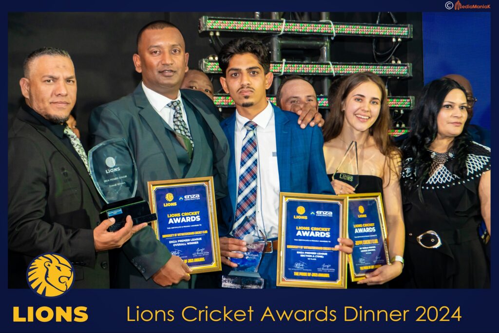 Award winners photographed at an awards dinner