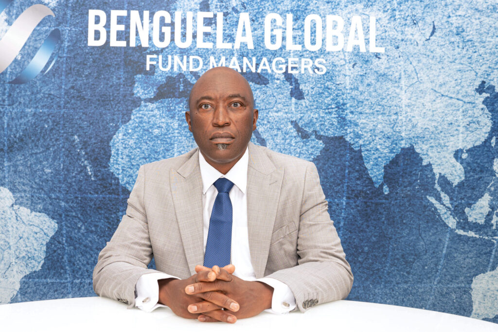 Executive portrait on a branded backdrop