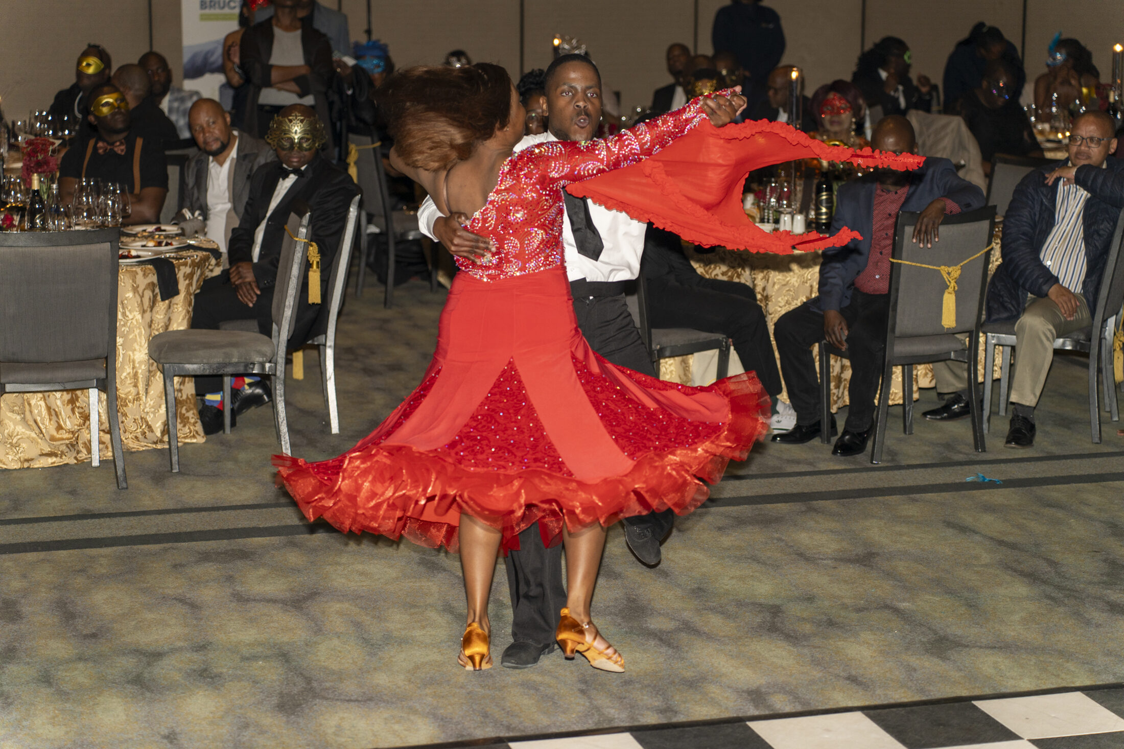 Couple dancing at a gala dinner
