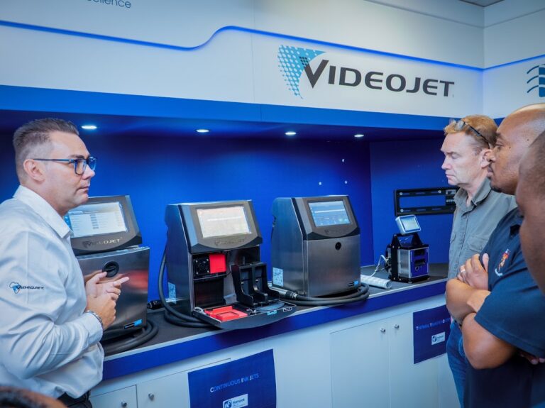 Delegates viewing printers at a demo station at the Nampak Customer Innovation event