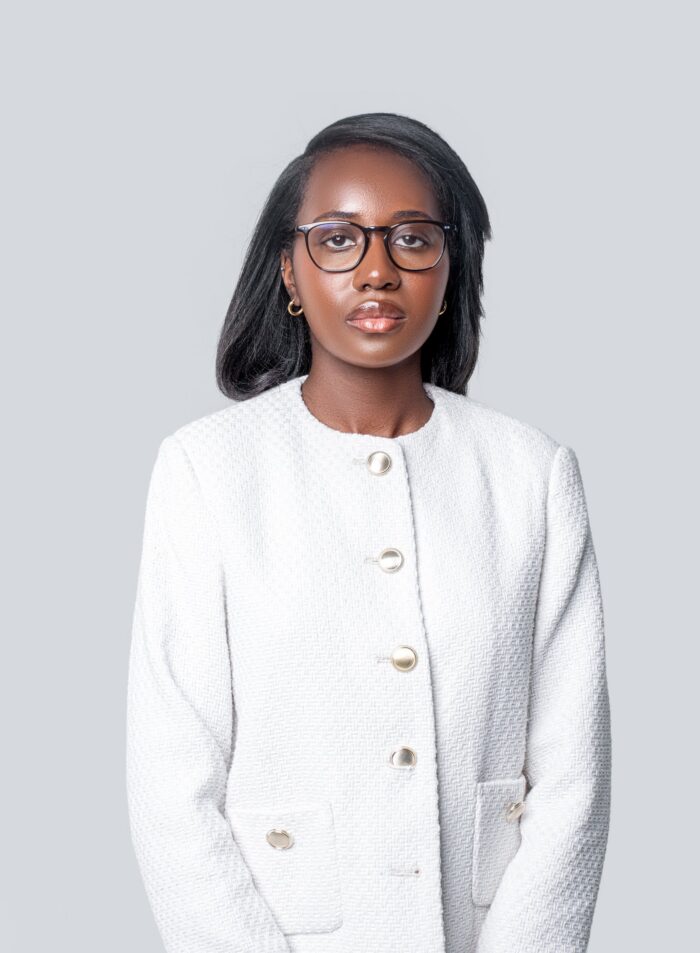 Professional headshot, white tweed jacket and glasses, by Studio24.7