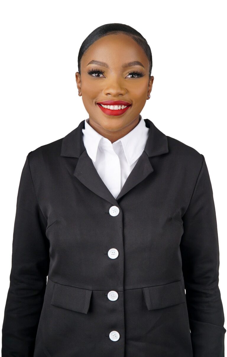 Professional headshot, black jacket with white collar on a white backdrop, by Studio24.7