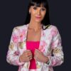 Professional headshot, floral blazer on a dark backdrop, by Studio24.7