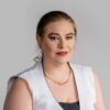 Professional headshot, white sleeveless top on a grey backdrop, by Studio24.7