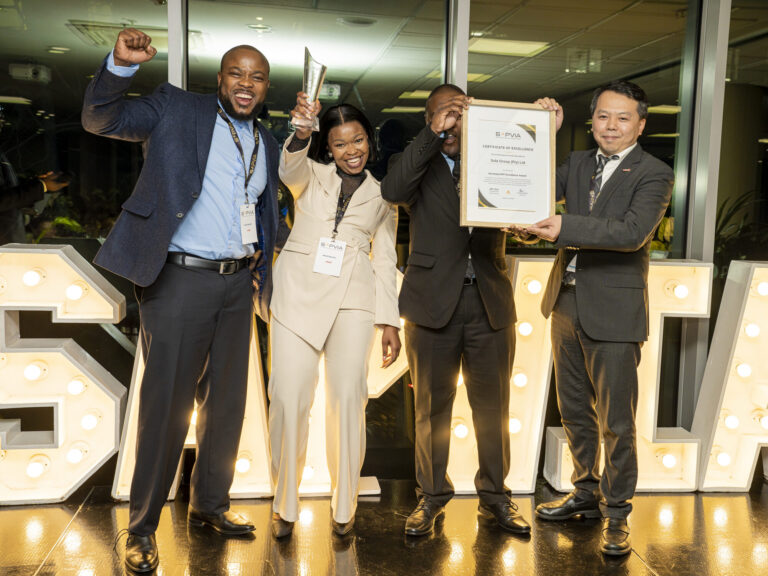 SAPVIA Industry Awards winners celebrating with a certificate and trophy